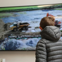 Child watching the Build Video